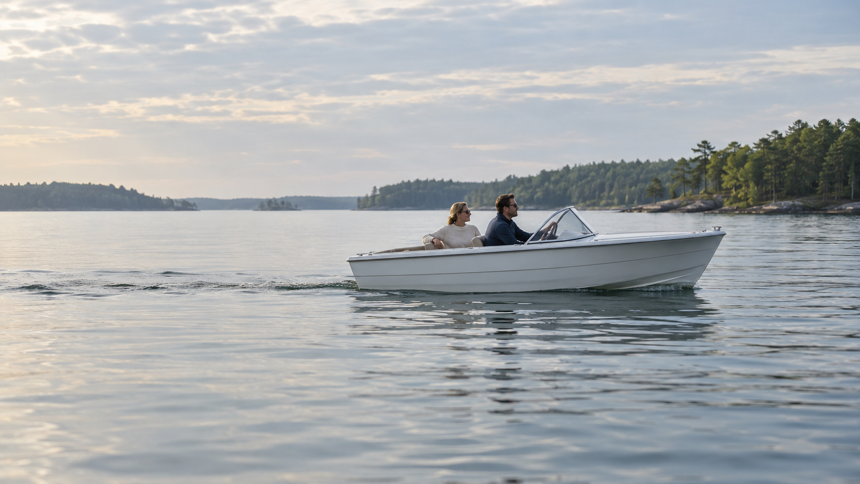 Concept lifestyle scene of a boat cruising along a calm lake.